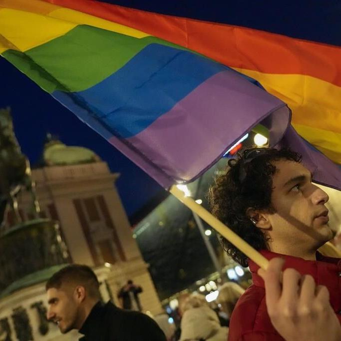 Activists and members of Serbia's LGBTQ+ community protest reported police harassment